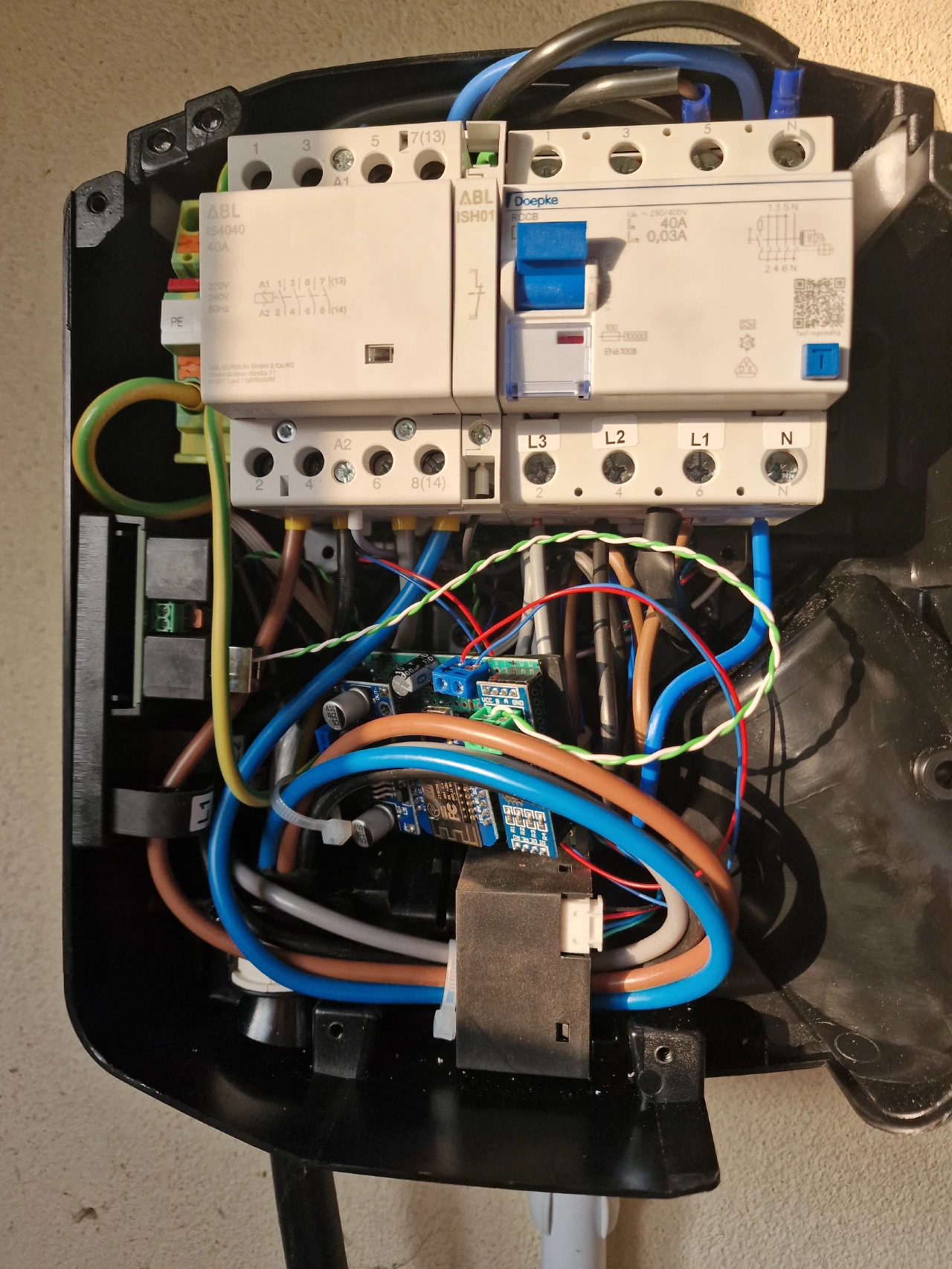 Insides of an eMH1 with a circuit board chucked into the empty spaces